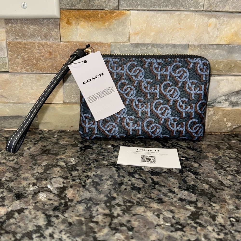 Coach corner zip blue and brown monogram wristlet NWT